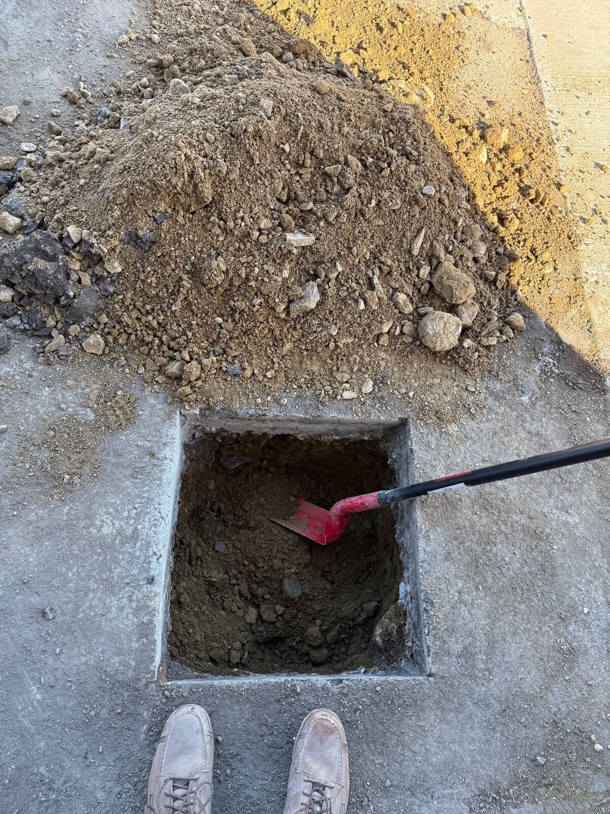 Steel bollard installation by Concrete Solutions in Shrewsbury Massachusetts