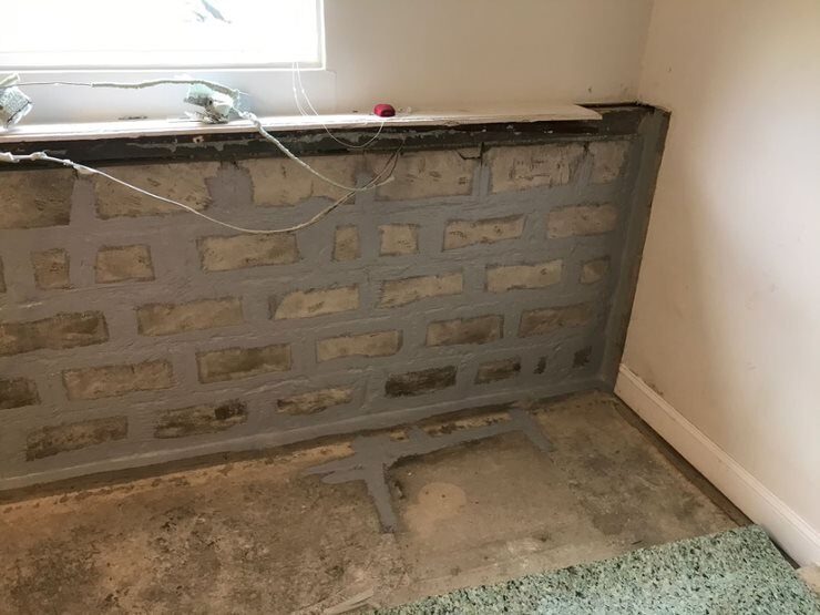 CMU concrete block wall installation by Concrete Solutions Massachusetts