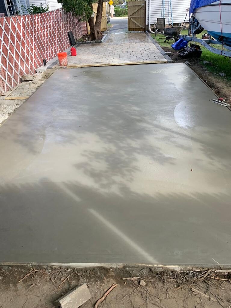 Poured concrete slab finish by Concrete Solutions LLC Massachusetts
