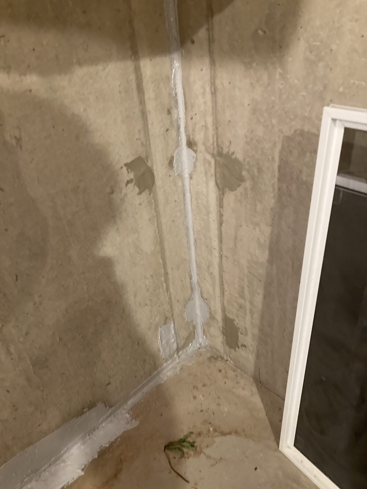 Hairline foundation wall crack sealed by Concrete Solutions in Eastern MA