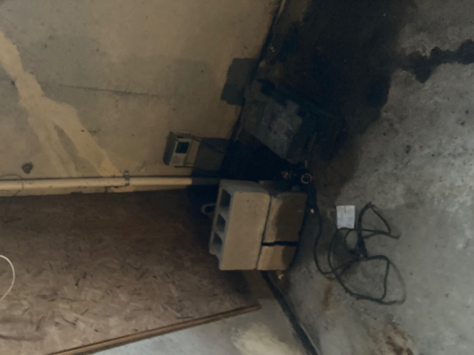 Sump pump basin installation by Concrete Solutions in Eastern MA